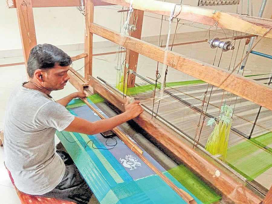 traditional A weaver at work at the Rural Tourism Complex, Pochampally.