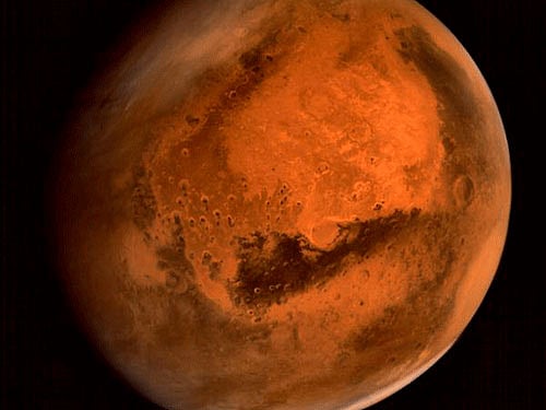 NASA scientists have proposed deploying a giant magnetic shield around Mars to protect its atmosphere from solar wind, that could make the red planet habitable for future generations of human colonists. File photo
