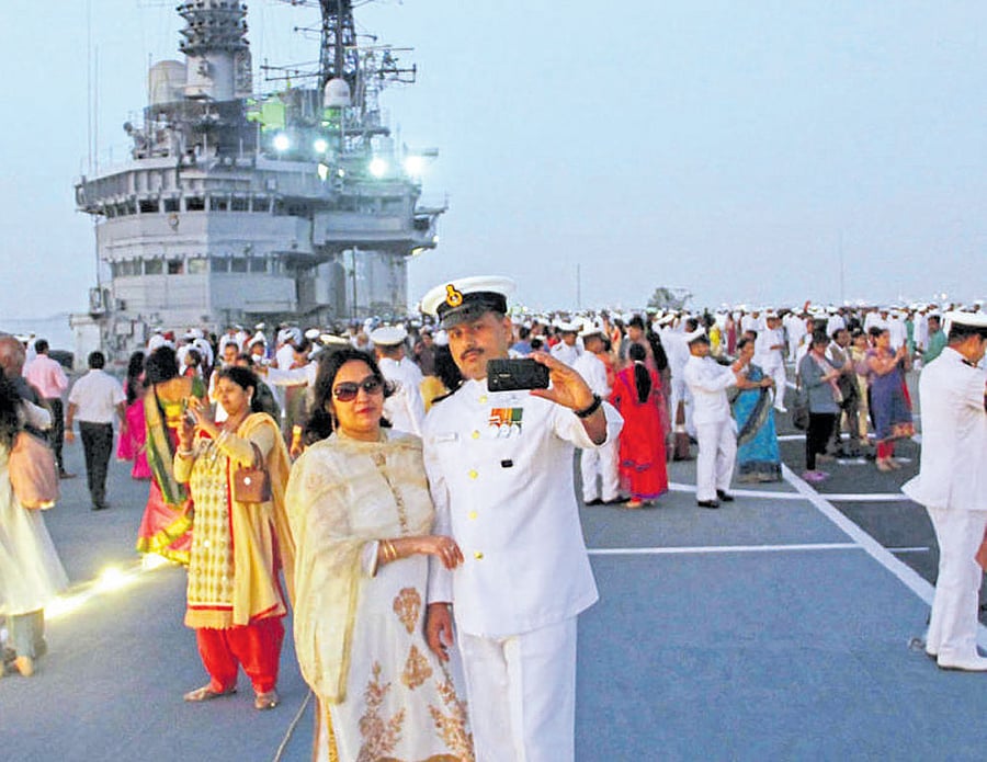 Goodbye note: Navy officials and families at the decommissioning ceremony of aircraft carrier INS Viraat in Mumbai on Monday. The longest serving warship of the world, INS Viraat has served for 30 years in the Indian Navy. DH Photo