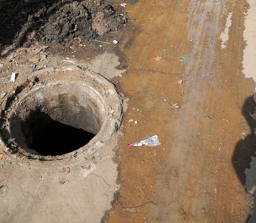 Due to suffocation he shouted for help, upon which the tractor driver who had accompanied them also entered the manhole to rescue them. dh file photo