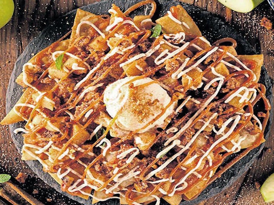 delicious 'Apple and Walnut Pie Nacho Crumble' and (right) 'Pizzachos'.