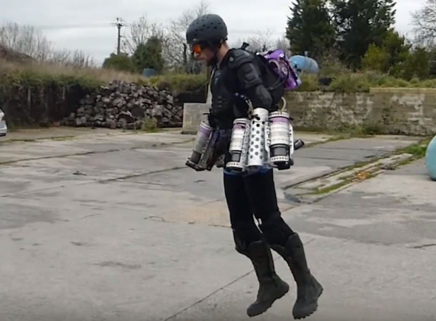 The futuristic ensemble consists of three sets of miniature jet engines attached to the arms and the back.