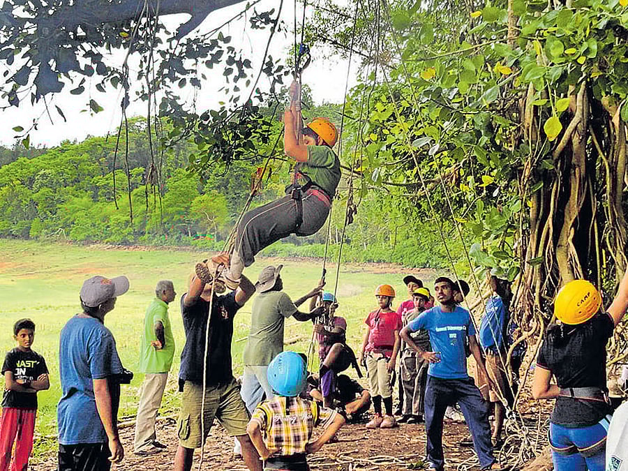 pursue your interest Kids learn jumaring technique at a camp organised by Karavali Adventure Centre and General  Thimayya National Academy of Adventure; (top) a student tries her hand at make-up at Malebillu summer camp, Kuppalli.