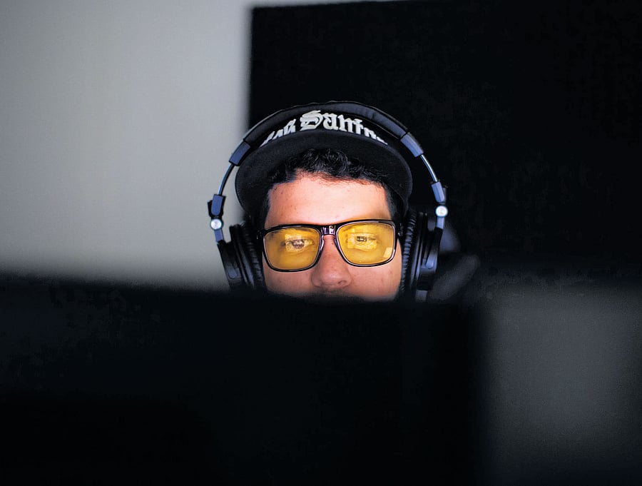 Andre Rebelo, live-streams his Grand Theft Auto 5 Mods game at home in Vancouver. INYT