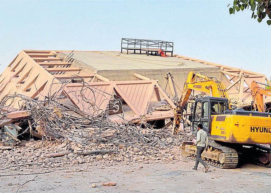 Remains of the iconic Hall of Nations structure at Pragati Maidan in New Delhi on Monday. PTI