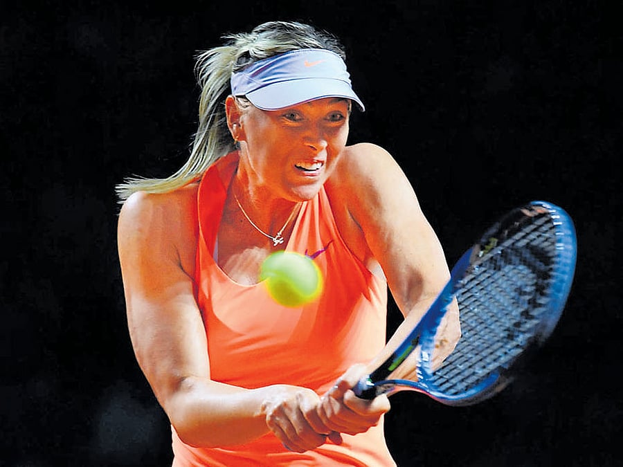 Russia's Maria Sharapova returns during her victory over Italy's Roberta Vinci. AFP