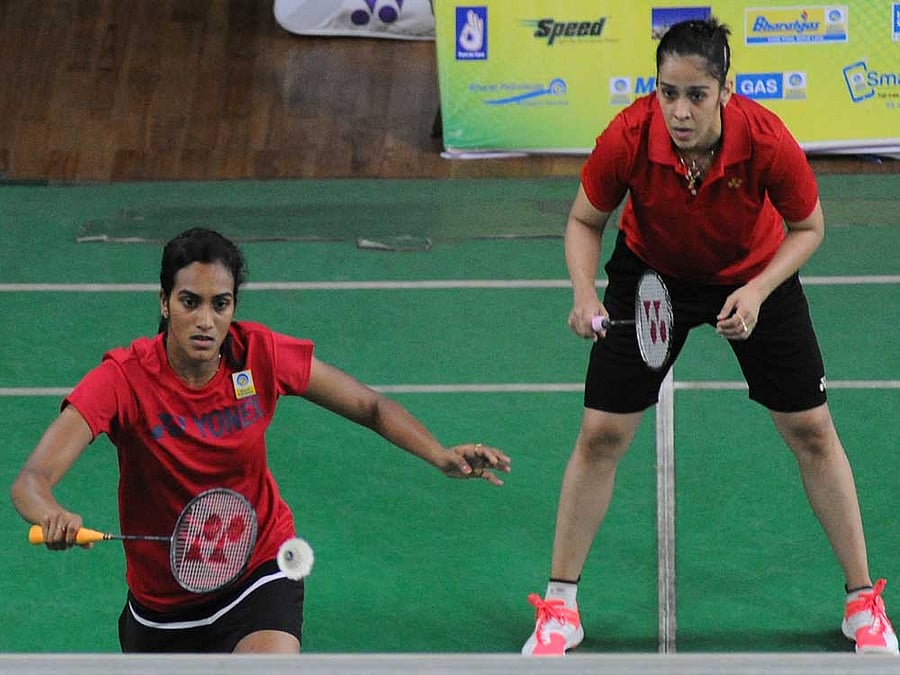 Dynamic duo: BPCL's doubles  pair PV Sindhu (front) and Saina Nehwal in action at the KBA courts. DH photo