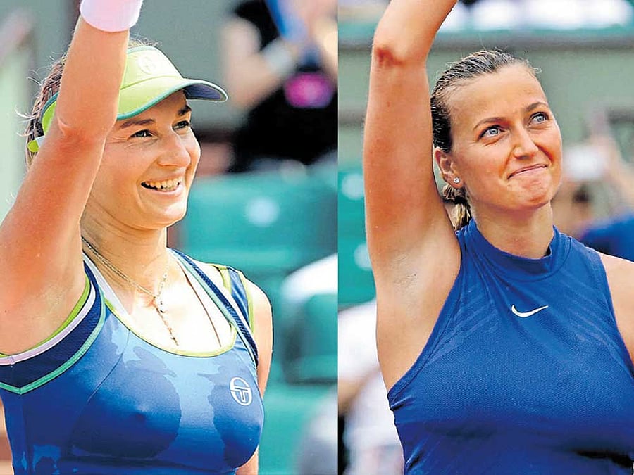 Russia's Ekaterina Makarova (left) celebrates her win over Angelique Kerber of Germany. Petra Kvitova of the Czech Republic acknowledges the crowd after her win over Julia Boserup of the US in Paris on Sunday. AFP