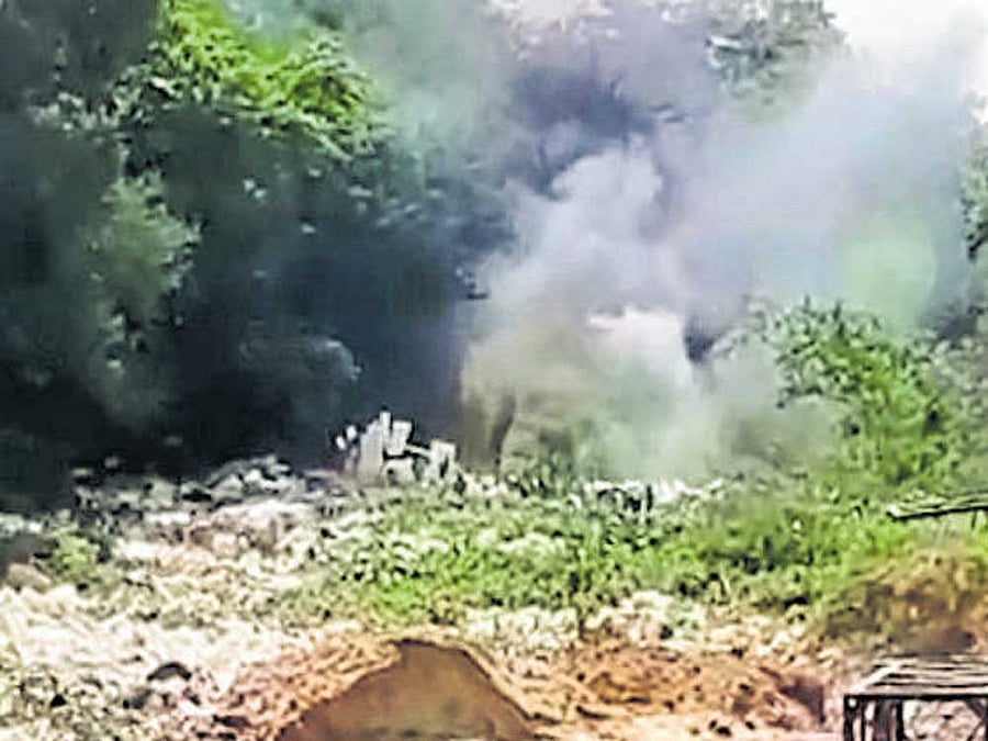 Smoke billows from Varthur lake as miscreants set garbage on fire.