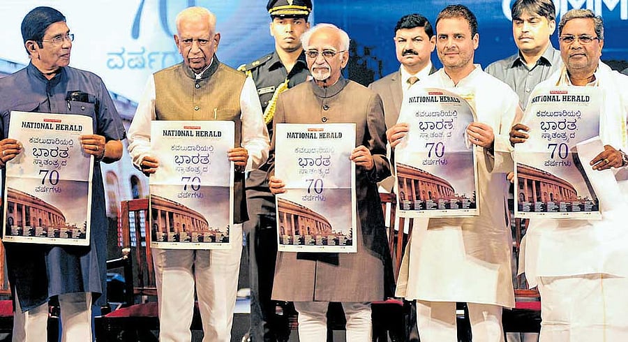 Vice President Mohammad Hamid Ansari (centre), Congress leader Oscar Fernandes, Governor Vajubhai Vala, Congress vice president Rahul Gandhi and Chief Minister Siddaramaiah release the commemorative edition of National Herald newspaper in Bengaluru on Monday.  DH Photo/Srikanta Sharma R
