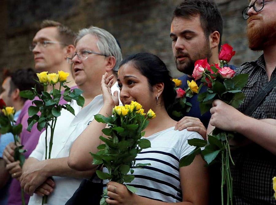 People take part in a vigil at Finsbury Park in north London, where a vehicle struck pedestrians in north London Monday, June 19, 2017. A vehicle struck pedestrians near a mosque in north London early Monday morning. AP/PTI Photo