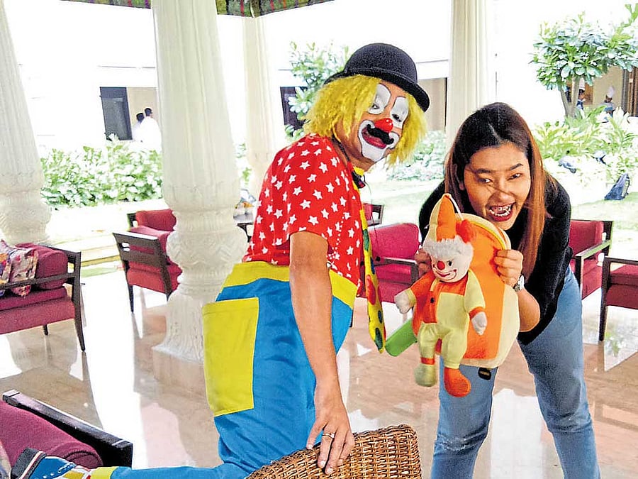 The city has its fair share of people who pursue or juggle their interests with their career. (Above) Sanjay Balsavar with a fan