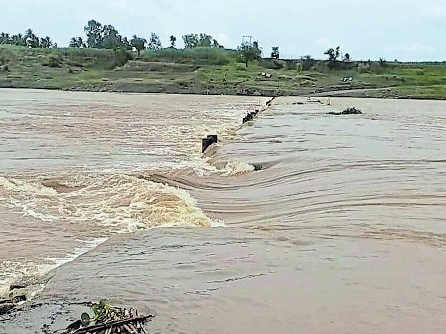 The low-lying bridge between Bavan and Saundatti across River Krishna of Belagavi district was submerged on Wednesday. The inflow into the river has increased owing to heavy rain in catchment areas in Maharashtra. DH Photo/Sudhakar Talwar