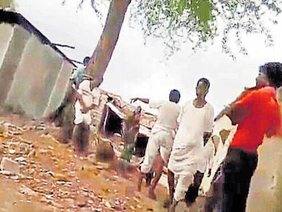 Mareppa Harijan and his son Ramesh who were tied to a tree and thrashed at Halagundakanala village in Sindhagi taluk, Vijayapura district.