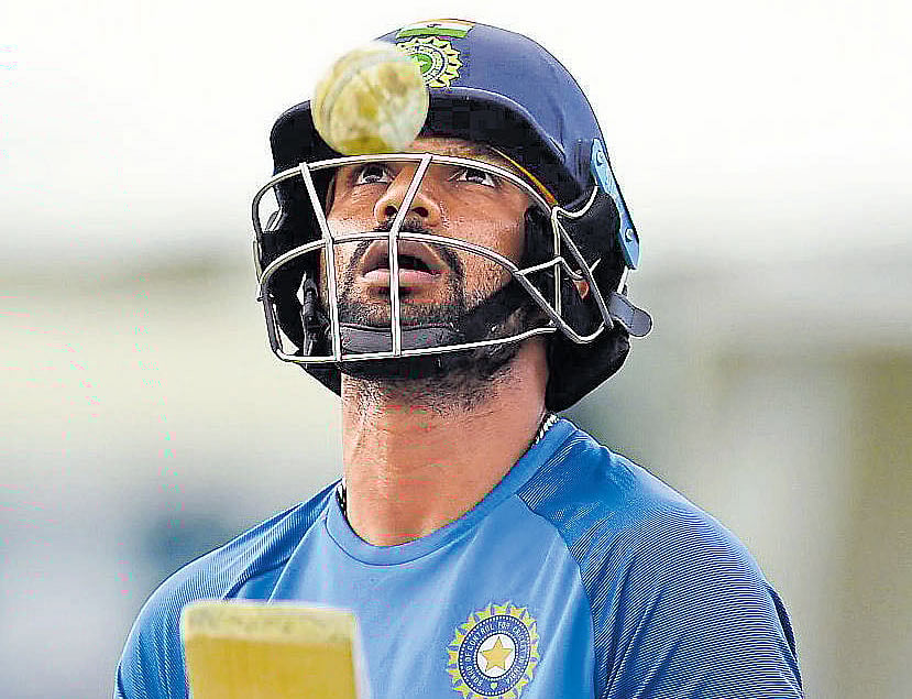 In-from India opener Shikhar Dhawan during a practice session at North Sound, Antigua on Thursday. AFP