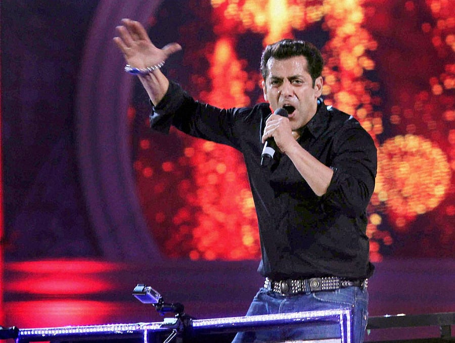 Salman Khan joined his friend, singer Kamaal Khan, on stage at the IIFA Rocks gala. PTI File Photo