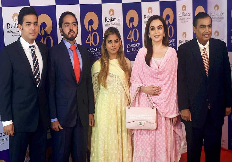 Reliance Industries Chairman Mukesh Ambani with wife Nita Ambani and children Anant Ambani, Isha Ambani and Akash Ambani arrives for the 40th annual general meeting (AGM) of the company in Mumbai on Friday. PTI Photo