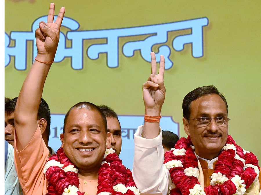 UP chief ministerYogi Adityanath and deputy chief minister Dinesh Sharma. PTI file photo
