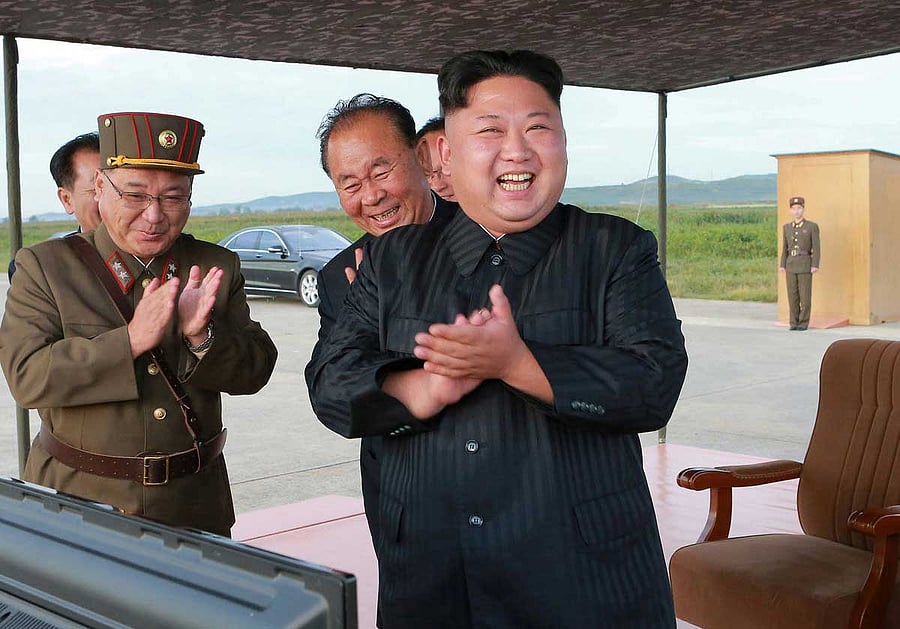 North Korean leader Kim Jong Un guides the launch of a Hwasong-12 missile in this undated photo released by North Korea's KCNA. Reuters photo