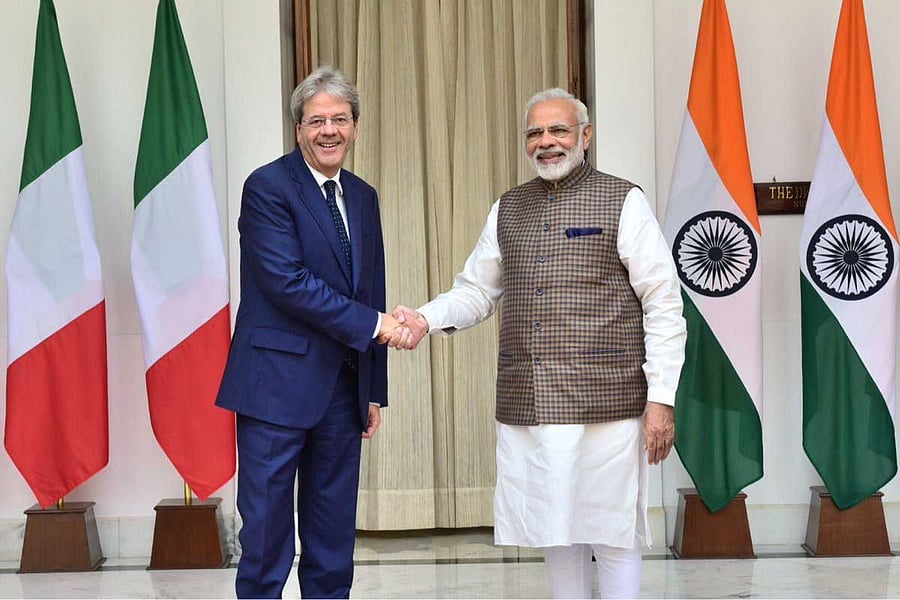 Prime Minister Narendra Modi and Italian Prime Minister Paolo Gentiloni during a ceremonial reception at Rashtrapathi Bhavan in New Delhi on Monday. Picture courtesy Twitter mea.gov.in