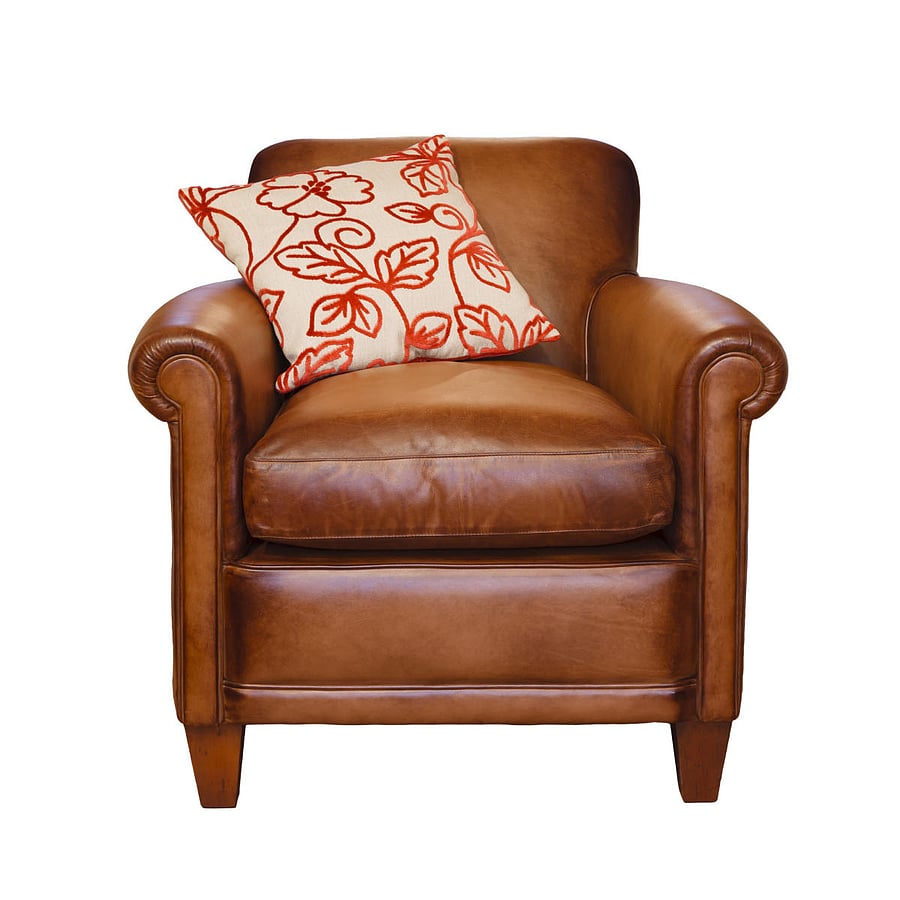 Leather armchair with a trendy cushion on a white background with clipping pathSimilar images from my portfolio:leather furniture