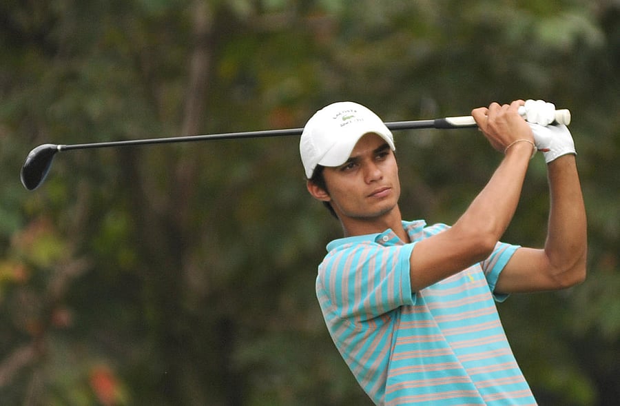 Ajeetesh Sandhu in action during The Global Green Bangalore Open 2011 golf tournament in KGA on Thursday./Photo by Kishor Kumar Bolar