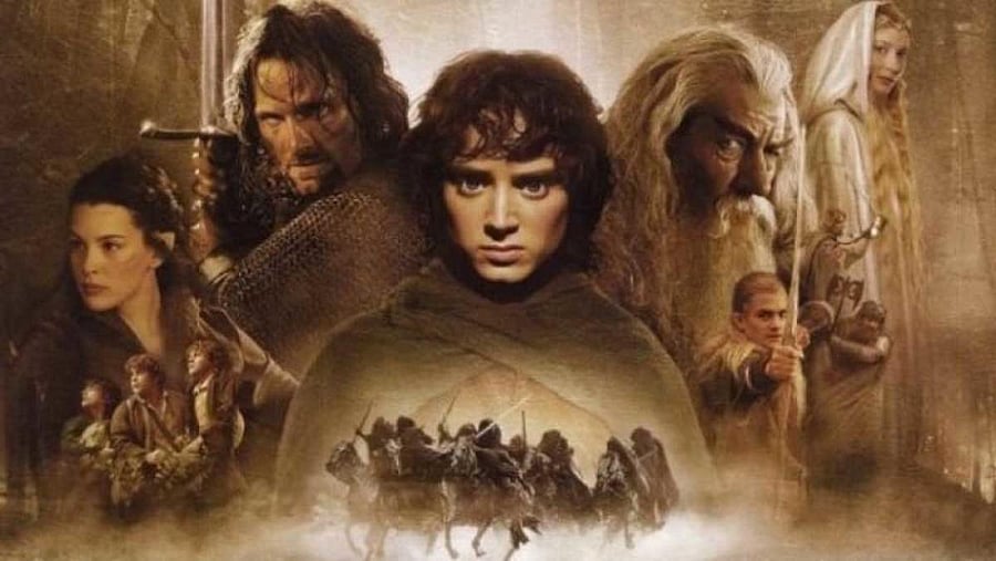 Poster of the film trilogy, showing the main characters and the Nazgl on the bottom.