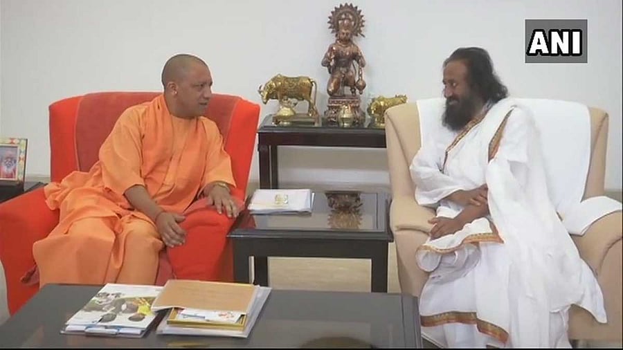 Ahead of his visit to Ayodhya on Thursday, Art of Living founder Sri Sri Ravi Shankar met Uttar Pradesh Chief Minister Yogi Adityanath in Lucknow on Wednesday, officials said. Picture courtesy ANI