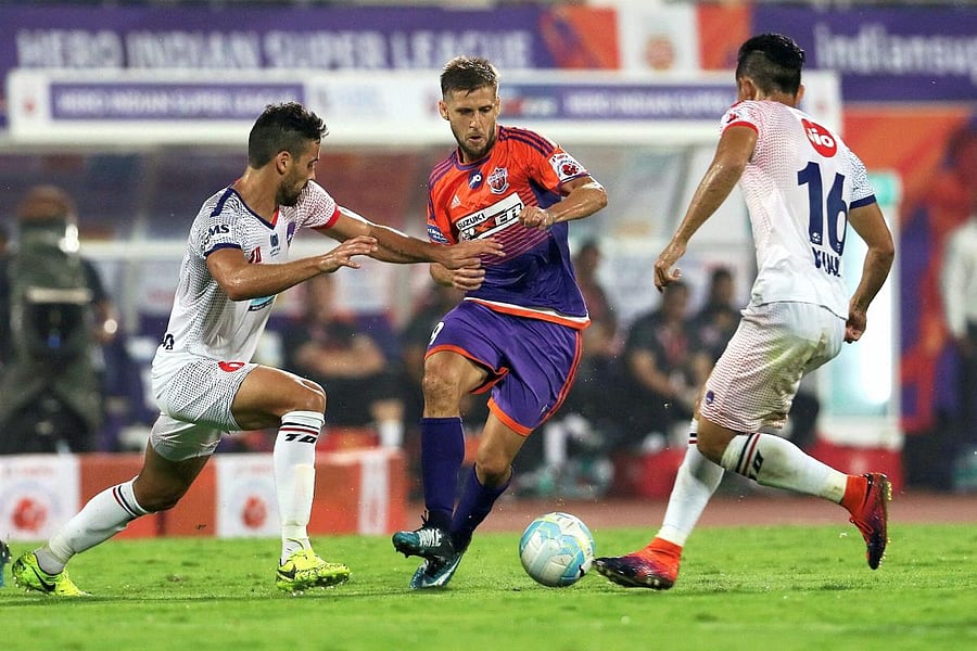 Delhi edge Pune in nervy affair