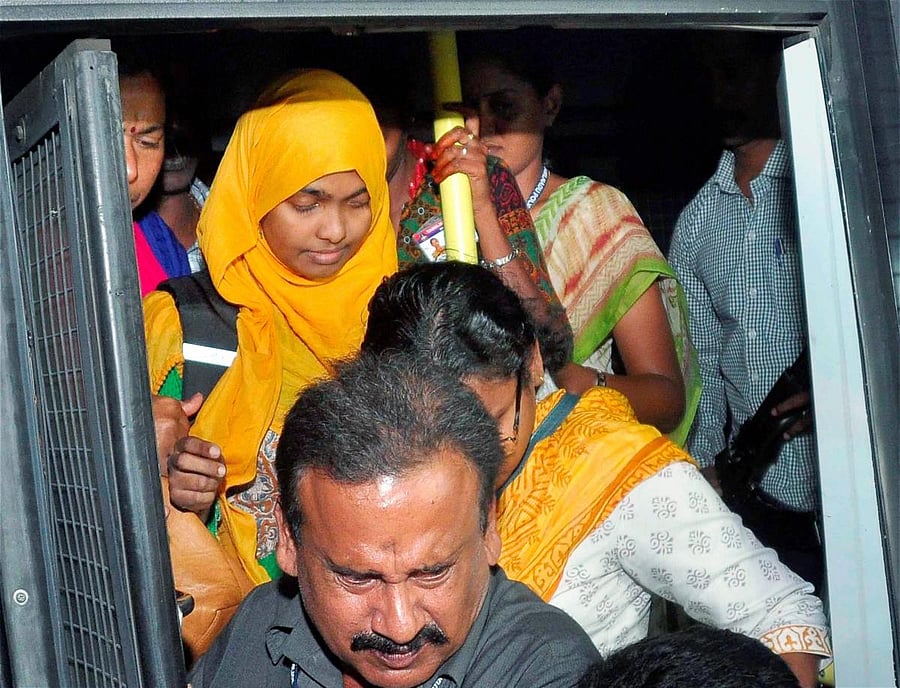 Hadiya, inter-religious marriage, love jihad case, came to Salem Homoeopathy College, after the supreme court order to continue her studies, as her father alleged that she was forcibly converted to Islam, in Salem on Tuesday. PTI Photo