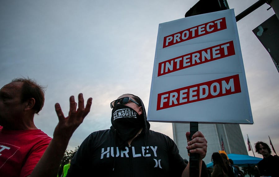 Supporter of Net Neutrality Lance Brown Eyes protests the FCC's recent decision to repeal the program in Los Angeles, California, November 28, 2017. (REUTERS/ Kyle Grillot)
