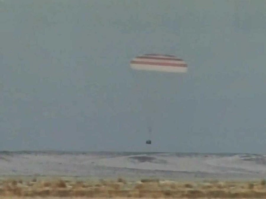 The Soyuz spacecraft carrying Expedition 53 crewmates Sergey Ryazanskiy, Randy Bresnik and Paolo Nespoli is pictured seconds from landing in the steppe of Kazakhstan in below freezing weather.