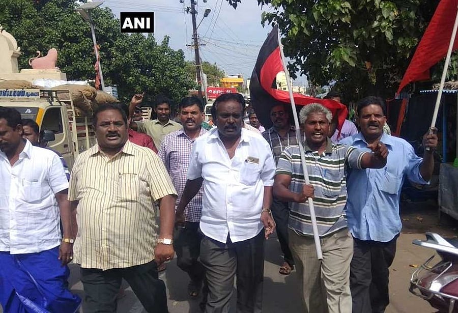 DMK functionaries celebrate after the court verdict declaring Raja and Kanimozhi not guilty in the 2G scam case. Twitter/ANI photo.
