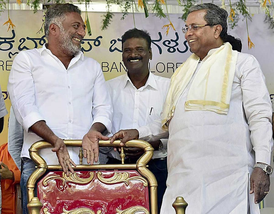 The 'Man of the Year 2017' award was presented by the Bangalore Press Club to Chief Minister Siddaramaiah and multilingual actor Prakash Rai here on Sunday. PTI photo