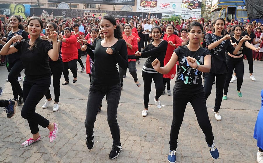 Students, staff and alumni of St Agnes College participate in a flash mob organised to launch the centenary celebrations of the college, in Mangaluru on Friday.