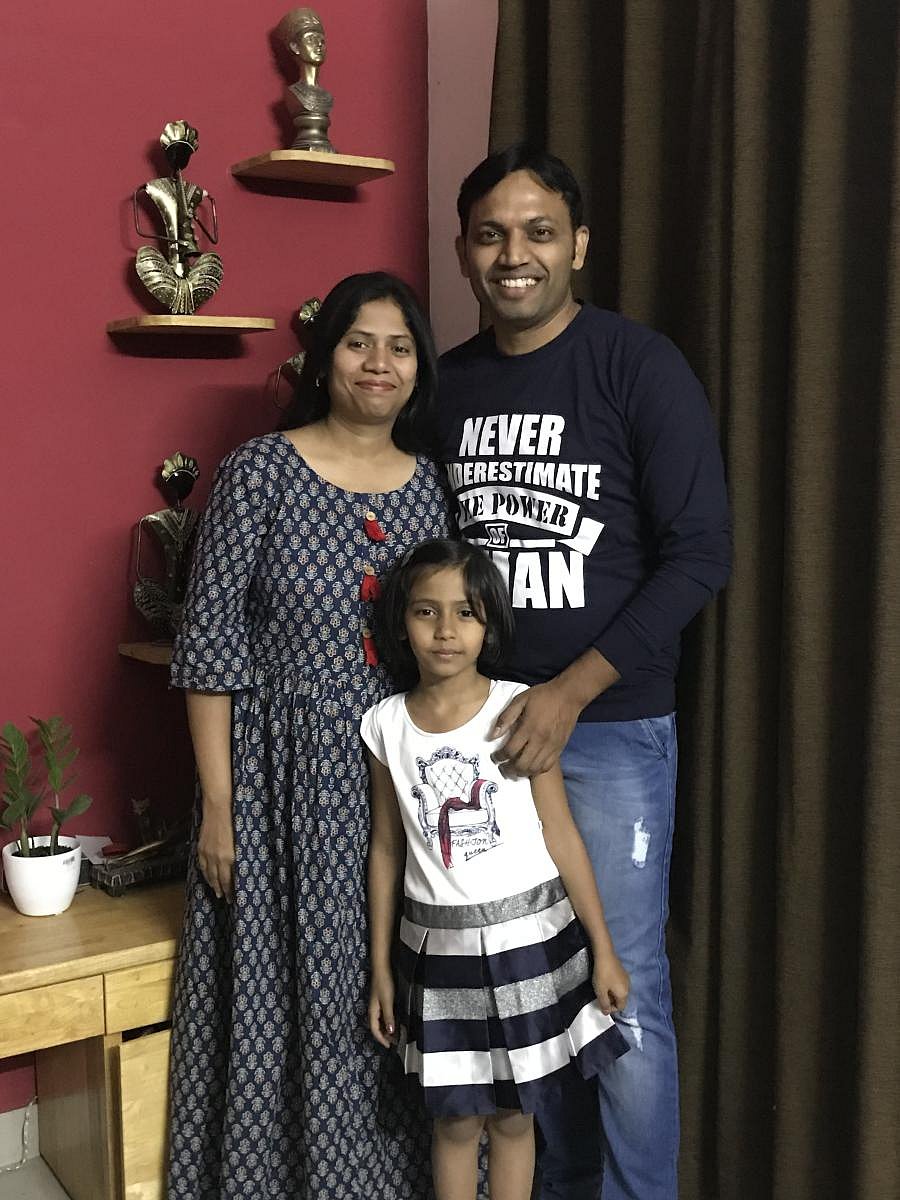 Vikas and Manjari with daughter Manavi.