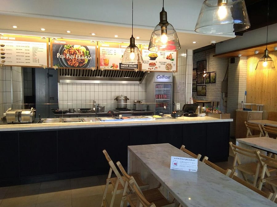 A view of the interiors of 'California Burrito'.