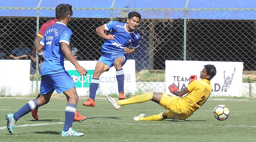 Karnataka's Shahabaaz Khan scores his side's opener during their clash against Puducherry on Friday. DH Photo/Srikanta Sharma R