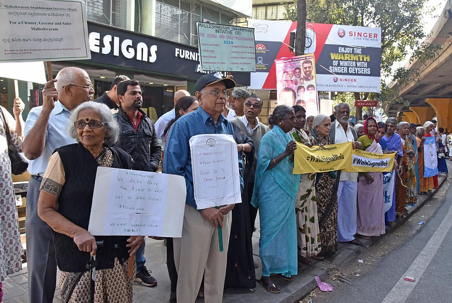 Senior citizens and various organisation members are participated in Nadeyalu bidi, 'Walk Signal Beku' for walkers organised by Citizens for Bengaluru at Richmond Circle in Bengaluru on Saturday. Photo by S K Dinesh