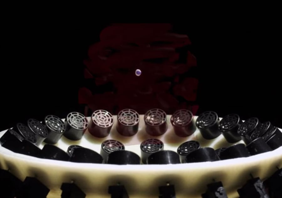 An object being levitated, trapped by acoustic particles. Photo: University of Bristol.