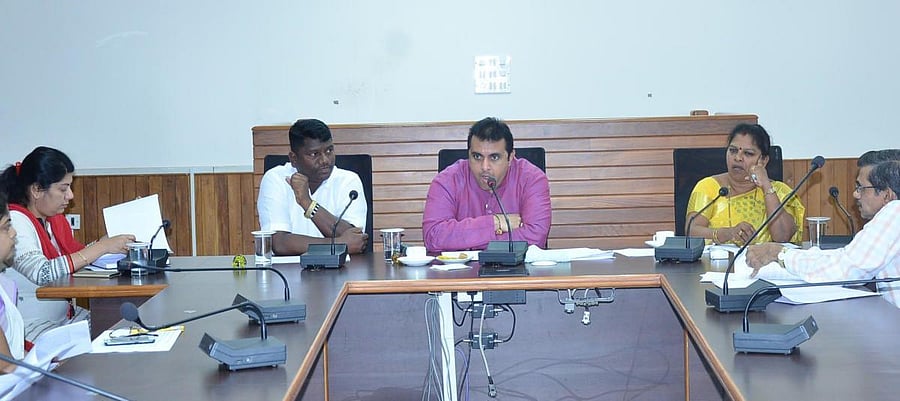 District-in-Charge Minister Pramod Madhwaraj chairs a meeting in Udupi.