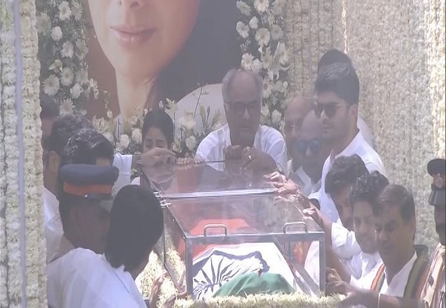 The body of the 54-year-old, who died in Dubai on Saturday, was taken in a hearse that was covered with white flowers, the colour of mourning. Image courtesy: Twitter