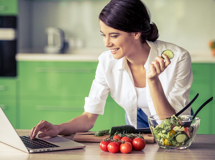 A woman eating while at work
