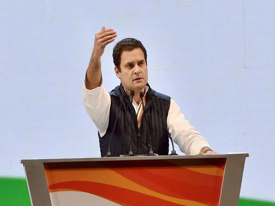 Congress President Rahul Gandhi speaks during the second day of the 84th Plenary Session of Indian National Congress (INC), at the Indira Gandhi stadium in New Delhi on Sunday. PTI Photo