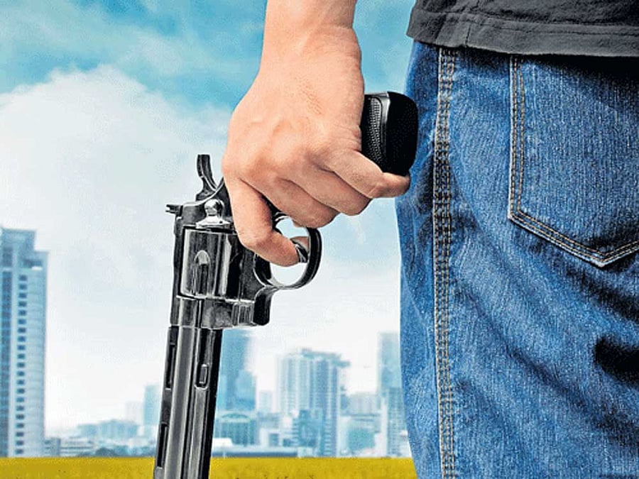 Senior Superintendent of Police, Vaibhav Krishna, said two bike-borne assailants, who were wearing helmets, barged into the scribe's residence and fired at him. DH illustration. For representation purpose