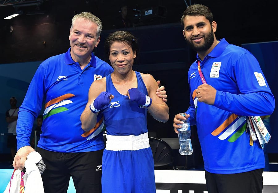 India's Mary Kom with women's coach Raffaele Bergamasco and coach Chhote Lal Yadav. PTI