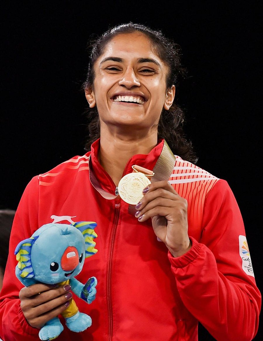 SMILE OF A CHAMPION India's Vinesh Phogat is jubilant after winning the women's 50 kg gold on Saturday. PTI