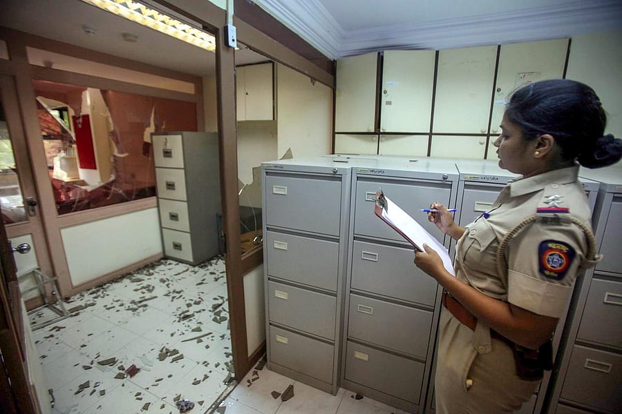 MNS workers vandalise Ratnagiri Refinery and Petrochemicals head office at Tardeo in Mumbai on Monday. PTI