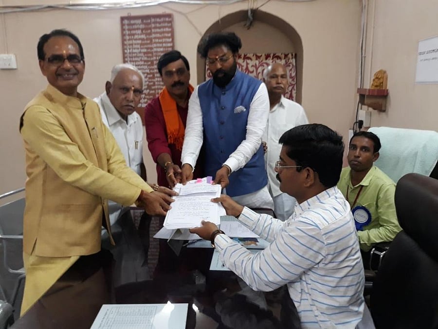 The mining baron accompanied close aide B Sriramulu when he filed his papers as the BJP candidate here.