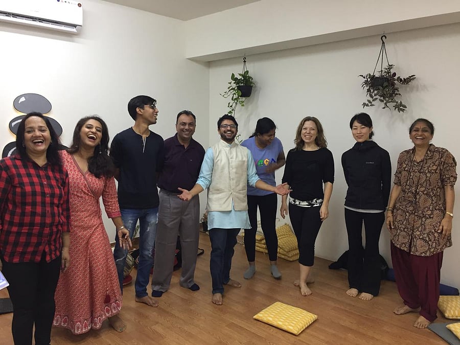 Ashwin Patil (in blue kurta) conducts laughter yoga sessions.Image courtesy: Ashwin Patil
